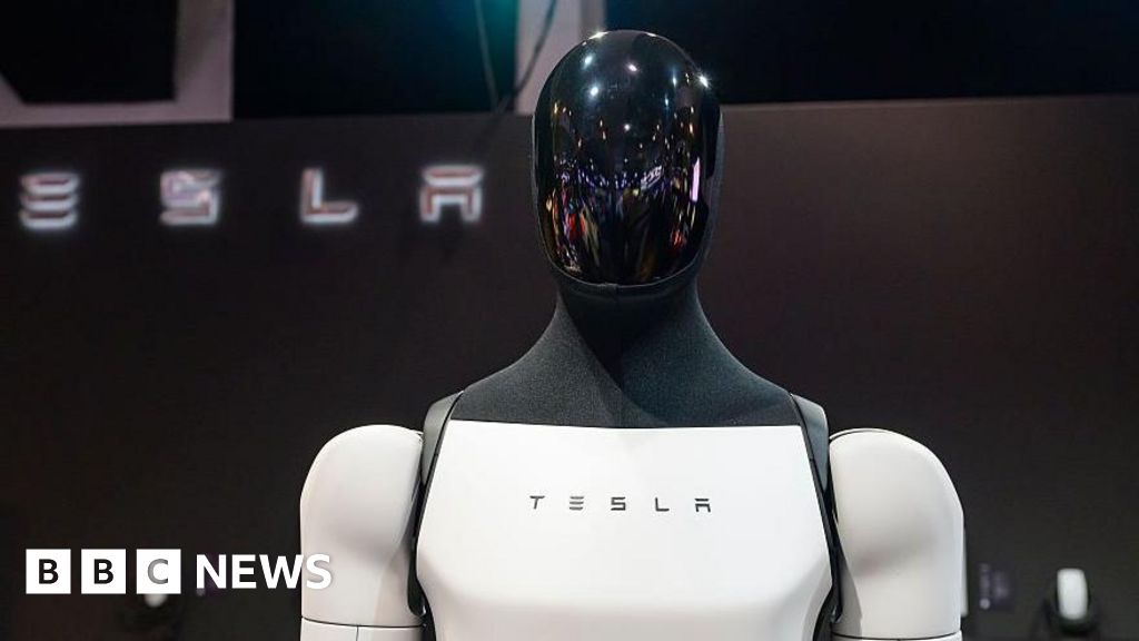 Tesla sees first annual revenue drop as it shifts to AI and robots